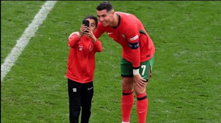 Stadiona girərək Ronaldo ilə şəkil çəkdirən 10 yaşlı Berata cəzalanıb